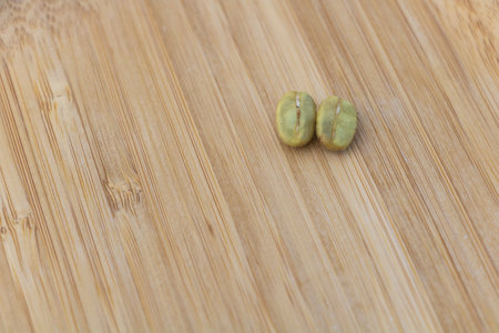 Aromatic Coffee Beans on a Rustic Wooden Background.の写真素材