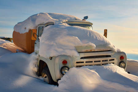 A truck filled with snow after snow storm in the mountains の写真素材
