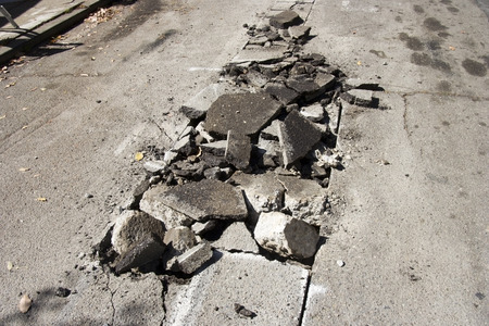 Construction site concrete street debris.