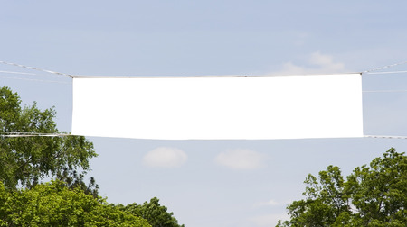 Blank banner with copy space stretched across blue sky. Horizontal.の写真素材