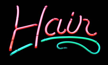 Neon HAIR sign on black background.の写真素材