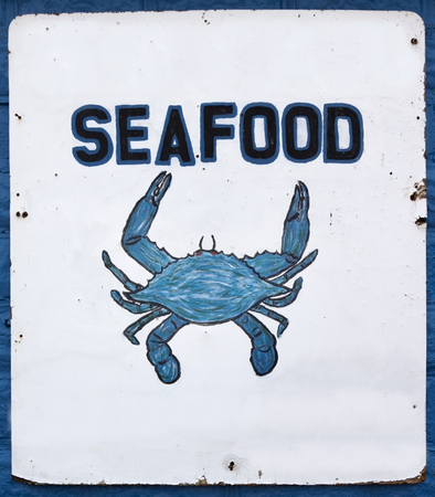 Handmade SEAFOOD sign with Chesapeake Bay blue crab.の写真素材