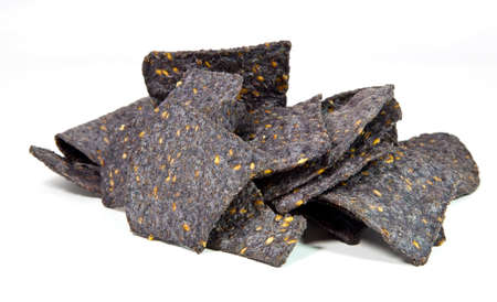 Pile of blue corn chips. Isolated.の写真素材