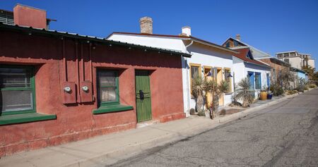 Vintage Old Tucson historic district adobe homes with blue Arizona sky.の写真素材