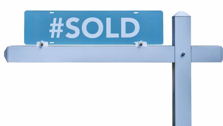 Isolated blue real estate SOLD sign.の写真素材