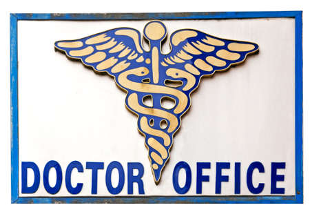 Somewhat weathered and dirty Caduceus DOCTOR OFFICE sign. Isolated.の写真素材