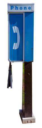 Vintage blue and white payphone booth with empty phonebook cover. Isolated.の写真素材