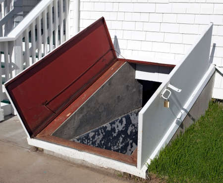 Open door to storm cellar.の写真素材