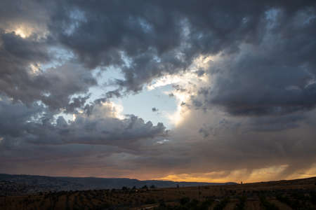 Inspirational motivation quote on dramatic sky background. The best way to predict the future is to create it.の写真素材