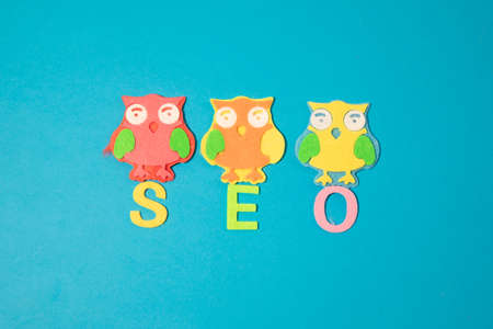 Valentines day concept with letters love and wooden heart. Decor in shape of word LOVE. white letters. Valentine concept. Color of the year 2022. Very peri tint. Selective focus.の写真素材