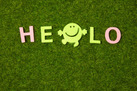 color letter in word hello on artificial green grass backgroundの写真素材