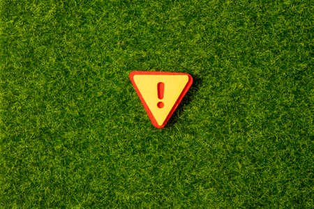 Green nature grass texture ecology background red traffic safetyの写真素材