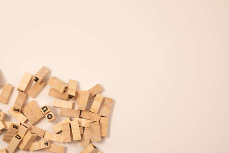 wooden toy blocks with paper background colorの写真素材