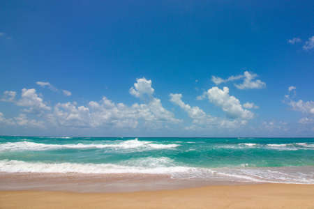 beach and beautiful tropical sea white clouds travel conseptの写真素材