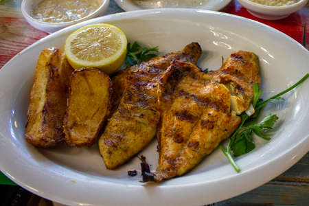Fried mackerel with baked potato