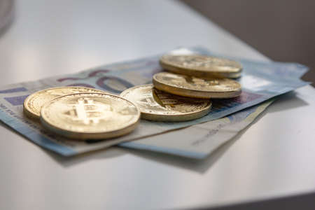 Bitcoin is an open source peer-to-peer electronic cash system that uses blockchain technology