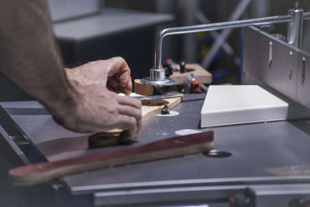 Chisel and small block plane with wood shavings. Carpenter cabinet maker hand tools on the...
