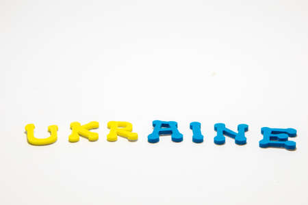 heart from the Ukrainian national flag of blue-yellow color and doves as a symbol of peace isolated white. The concept of participation of the Ukrainian people in the war with Russia. Not war conceptの写真素材