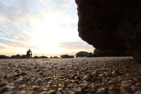 Man alone in the sea lonely feeling sunset time