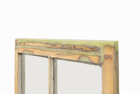 Close up of a restored and preserved sash window frame filled with resin. Sash window restoration.の写真素材