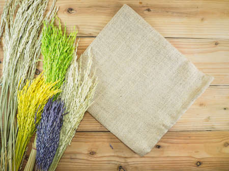 colorful paddy rice ,like a flowers on wood background