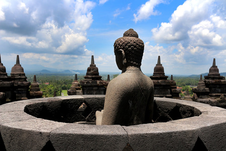 this statue is highlight of Borobudur in Indonesiaの写真素材