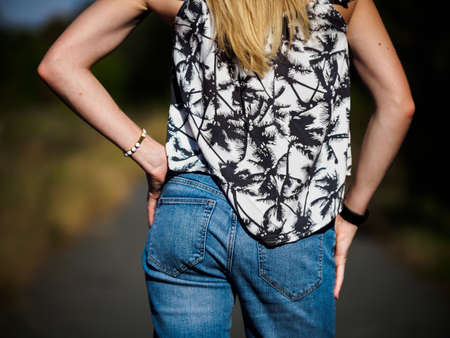 woman with hands on the sideの写真素材