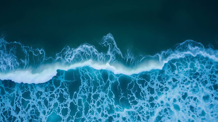Experience the raw, untamed beauty of the ocean from above. This stunning aerial perspective showcases powerful waves and intricate foam, perfect for evoking nature's energy and tranquility.の素材
