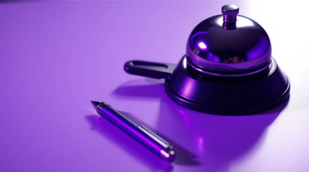 Evoke a sense of refined hospitality with this sleek call bell and pen, illuminated by a vibrant purple hue. Perfect for upscale hotel or service industry concepts.の素材
