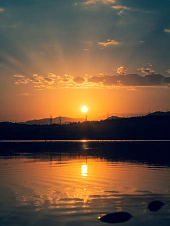 sunset over lakeの写真素材
