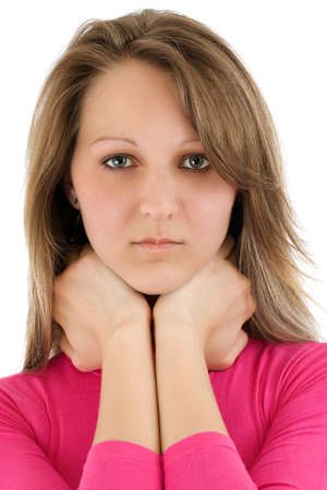 Closeup portrait of a serious woman on white backgroundの写真素材