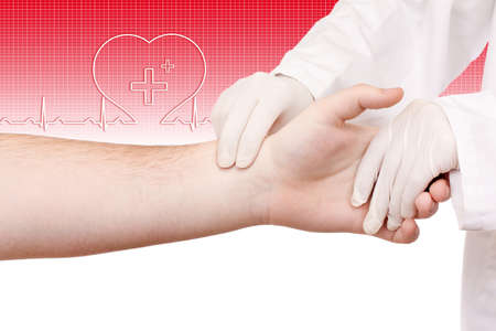 Doctor checking patient's pulse - electrocardiogram
