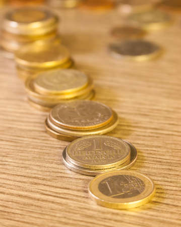 Old Stacked Coins. Deutsche Mark on Focus.