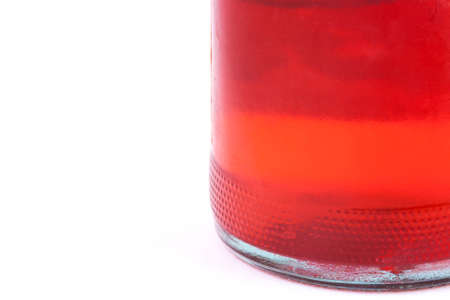 Red drink in the bootle. Wuth white backgroundの写真素材