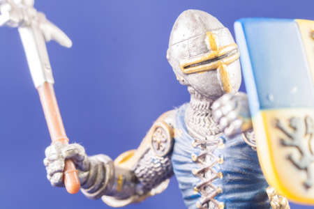 image of Small medieval soldier on blue backgroundの写真素材