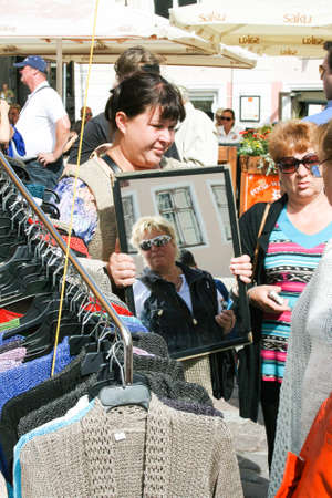 Estonia - Tallinn - july 2012: Trades and negotiations at the market in Tallinnのeditorial素材