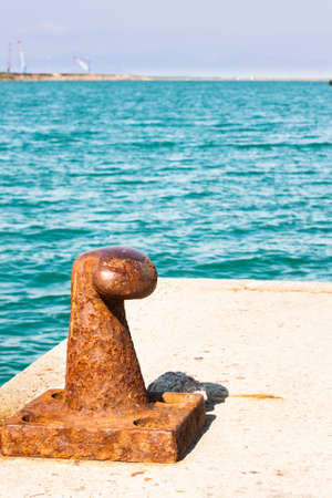 Rusty bollard for mooring boats .の写真素材