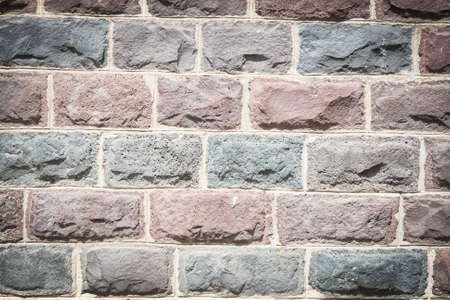 Basalt blocks lined. Close up of a wall of stone.の写真素材