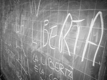 blackboard in old prison: Long life freedom - Viva la LibertÃ の写真素材