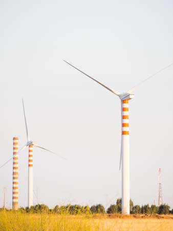 Wind Turbines in the country at sunset.の写真素材