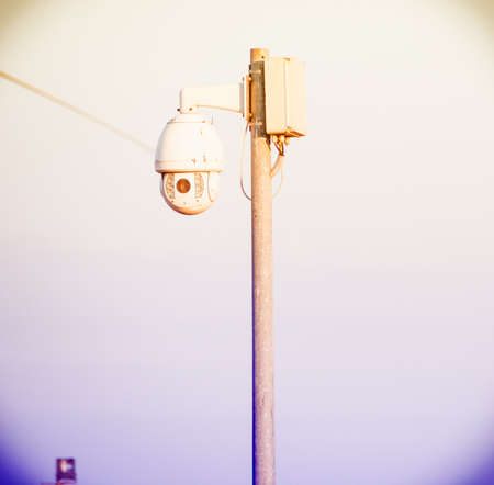 industrial camera control. Camera control near a metal fence in industrial place