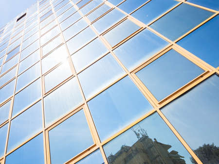 Glass reflection colored. Reflection in glass office building