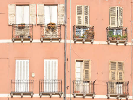 eight Windows on the sunset. Particular of a buildingの写真素材