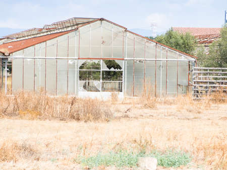 greenhouses abandoned agriculture. concept of abandonment of agriculture as a productive sector.の写真素材