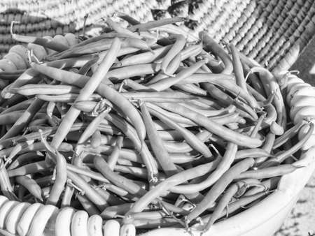 basket of green beans. Fruits and vegetables in season exposed in a street marketの写真素材