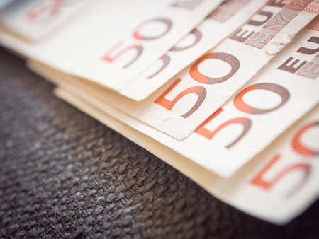 Euros with dark background. Concepts for moneyの写真素材