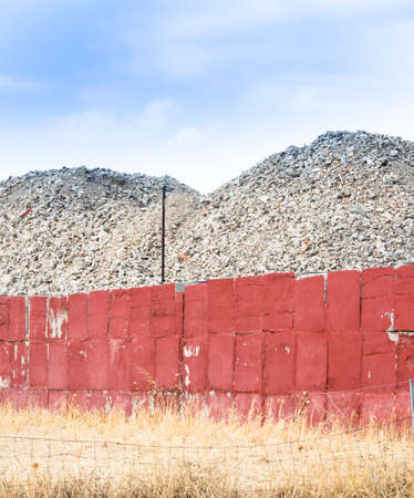 deposit terrain wall. Wall restrainig soil in industrial placeの写真素材