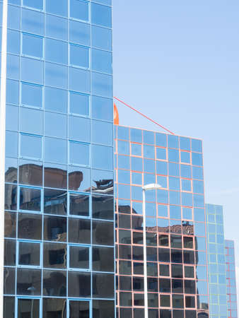 Glass reflection colored. Reflection in glass office building