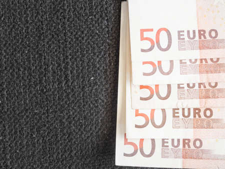 Euros with dark background. Concepts for moneyの写真素材