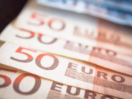 Euros with dark background. Concepts for moneyの写真素材